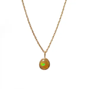 Small Freeform Ethiopian Opal With Green Reflection On 9ct Gold Chain